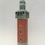 Photograph of a cardboard model of a war memorial